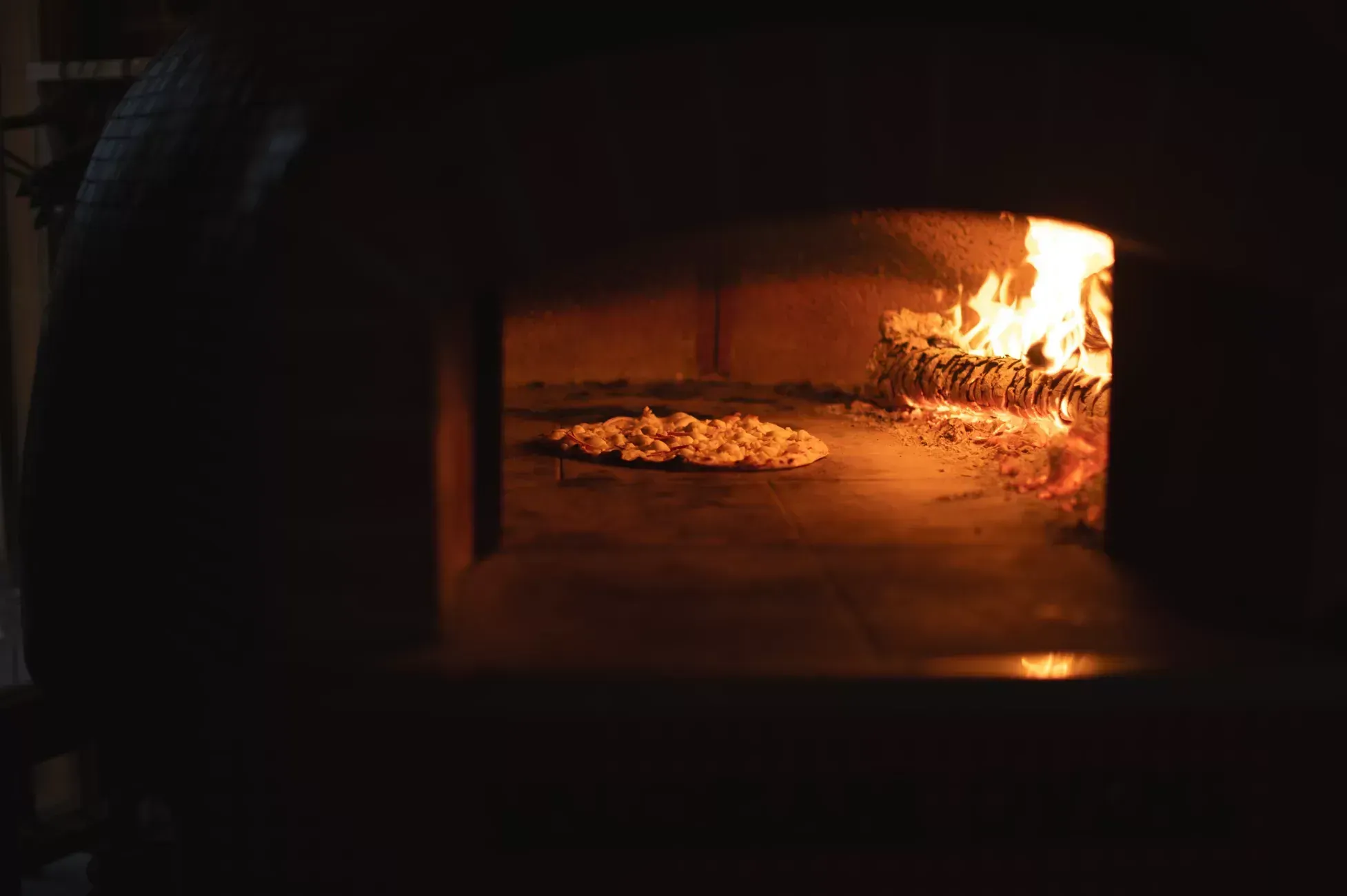 Close-up of a pizza inside an Italian oven